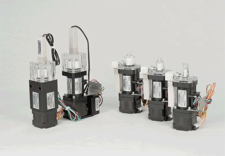 Valve Integrated Syringe Pumps & Valve within Pump